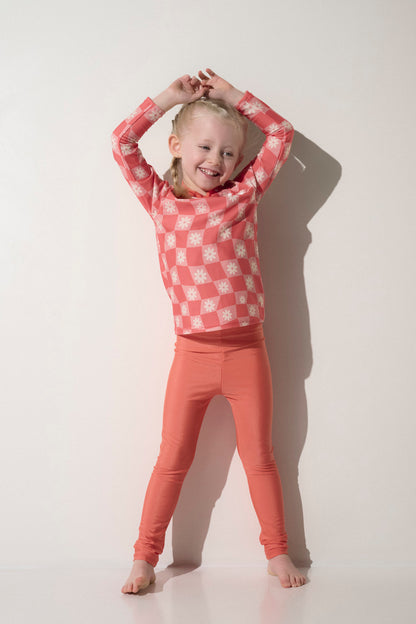 Legging anti-UV rose pour fille, léger et respirant, parfait pour les jeux ensoleillés, avec protection UPF50+.