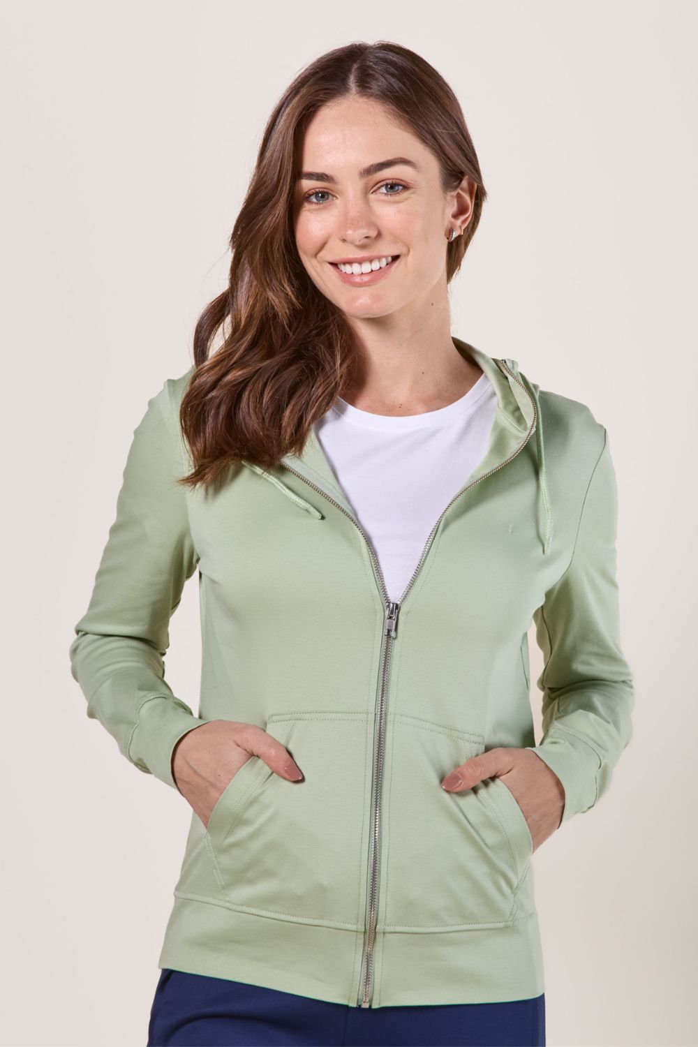 Sweat-shirt anti-UV femme, couleur Herbe Fraîche, avec capuche et poches, offrant protection UPF50+.